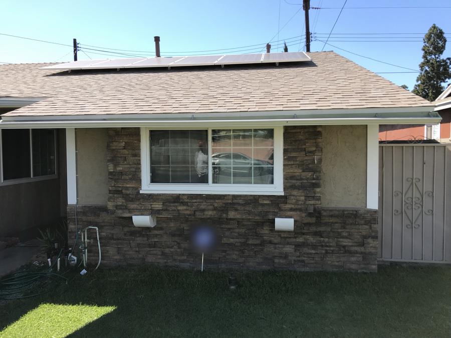 After: Stone veneer & exterior paint, Carson