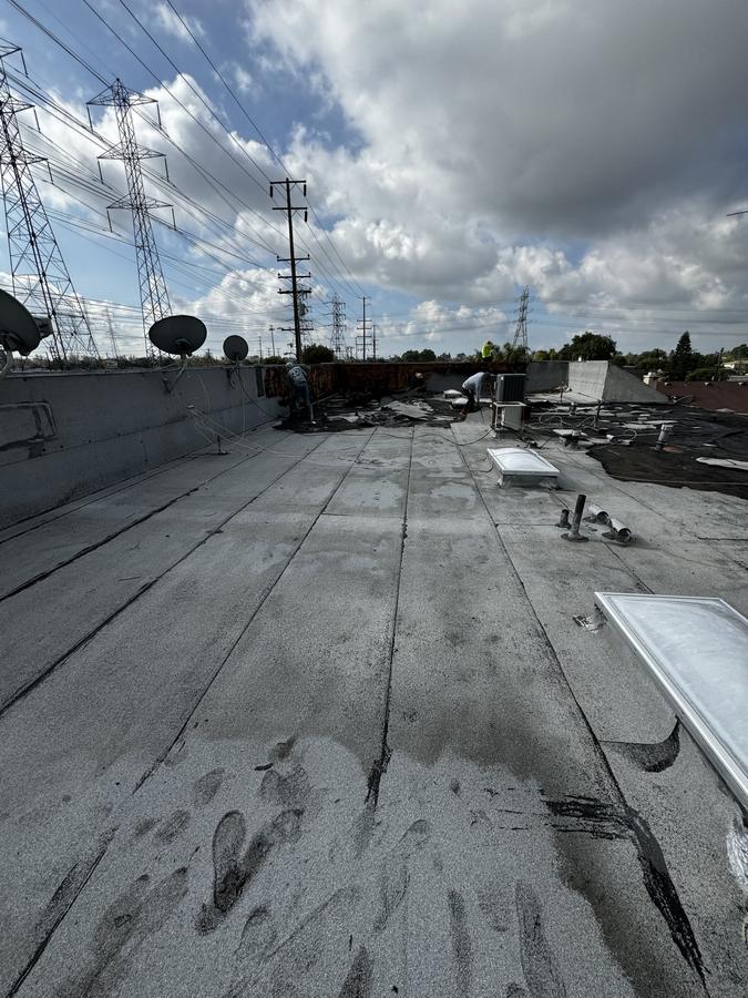 Before: Flat roof, Bellflower